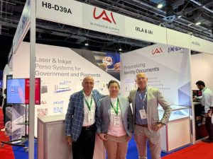 IXLA and IAI industrial systems sales representatives at Seamless Middle East