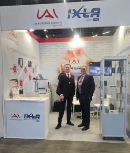 IAI industrial systems and IXLA sales representatives at the Integraf Currency+ Identity exhibition.